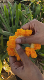 Load and play video in Gallery viewer, Orange Bubbles Crochet Scrunchie
